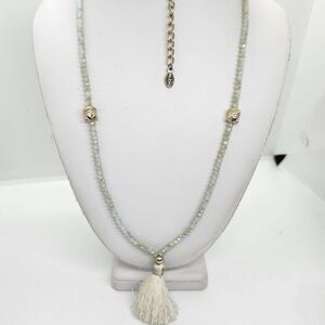 Aldo Sea Foam Crystal‎ Buddha Tassel Necklace